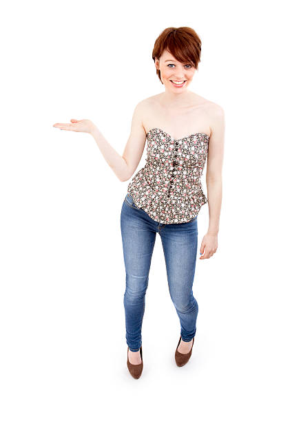 istock Attraktive brunette female with pointing hand on white 171250044