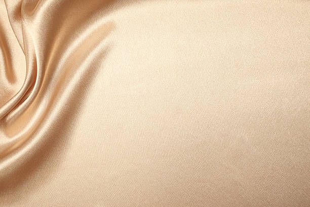 sfondo di seta beige - stoffa foto e immagini stock