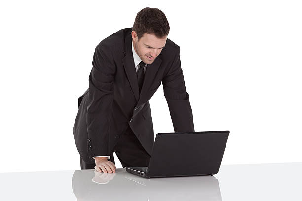 istock Businessman looking at a laptop 171250861