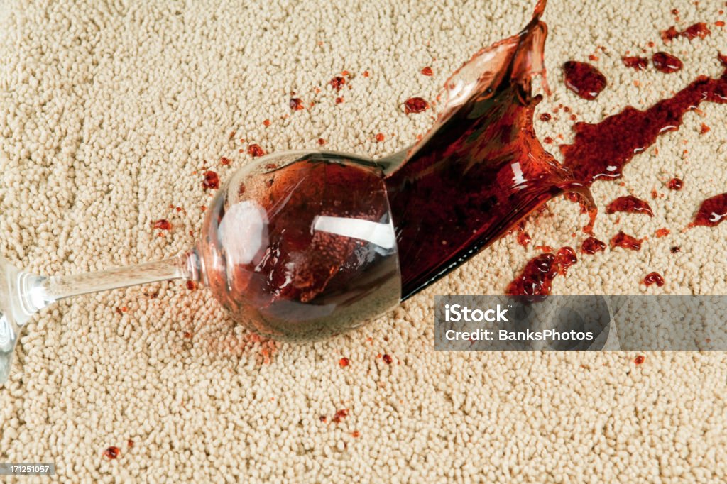 Wine Glass Falls onto Carpet  Carpet - Decor Stock Photo