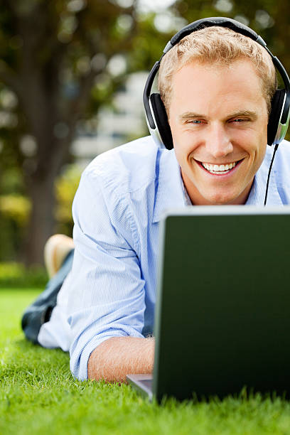 istock Cheerful Young Man Enjoying Music 171251577