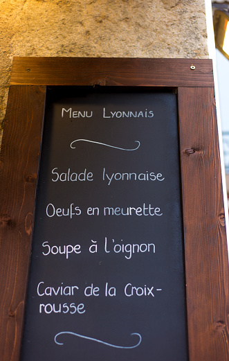 Lyon, France: A handwritten blackboard menu outside a restaurant in Vieux Lyon.