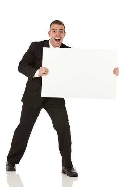 istock Businessman showing a placard 171251904