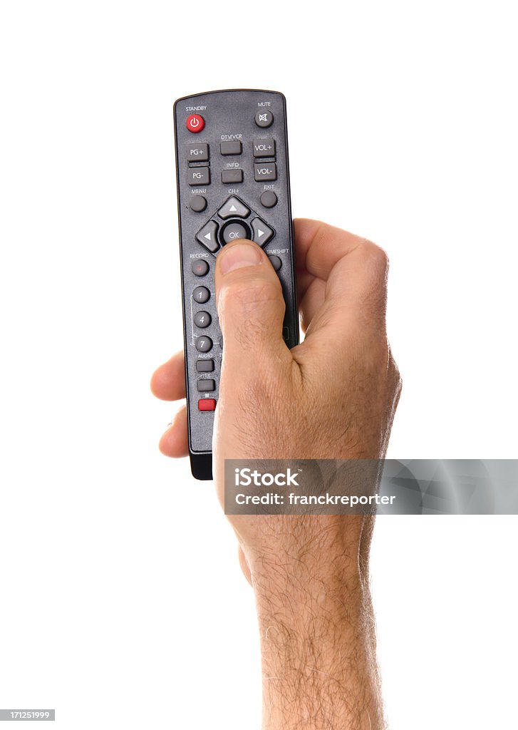 Zapping com controle remoto da tv - Foto de stock de Botão - Peça de Máquina royalty-free