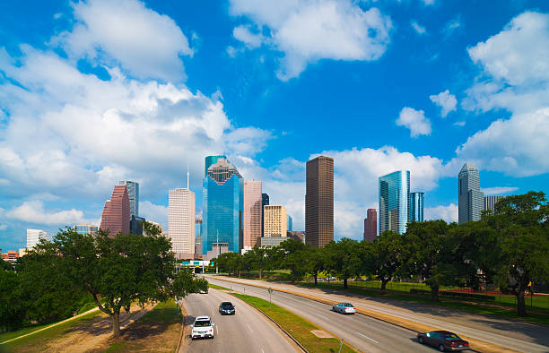 istock Houston skyline, parkway, and clouds 171252360