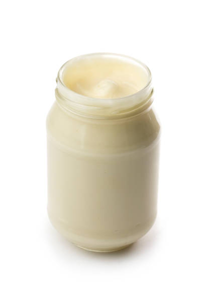 istock An open glass jar of mayonnaise on a white background 171252397