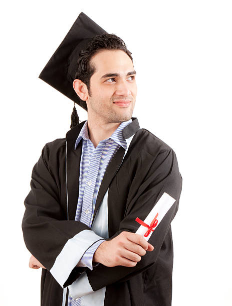 istock Man in graduation cap and gown holding diploma 171252508