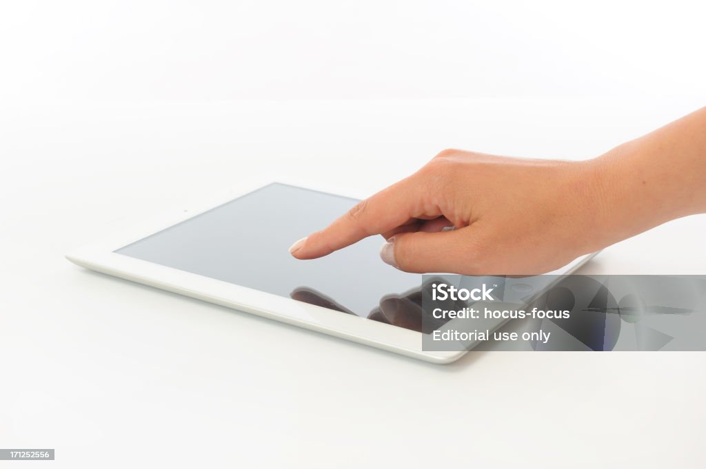 Touching iPad 3 - Foto de stock de Adulto libre de derechos