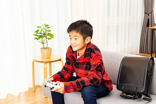 A boy playing video games.