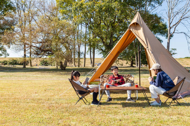 A family enjoying camping.
