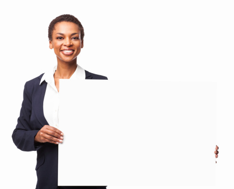 Portrait of an attractive African American businesswoman holding a blank sign board. Horizontal shot. Isolated on white.
