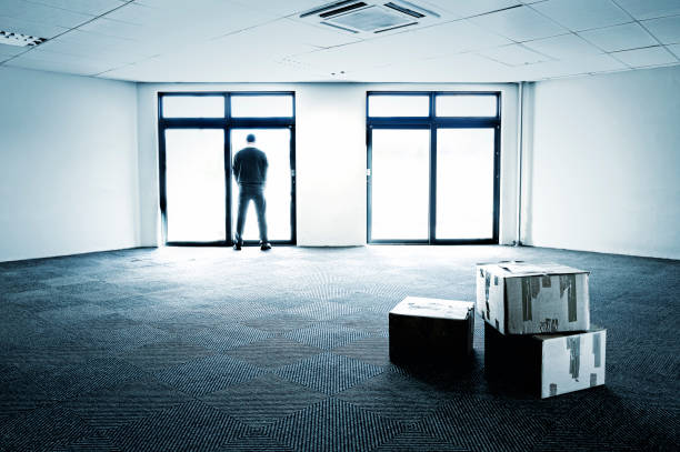 istock Blue-toned empty office showing business failure 171254345