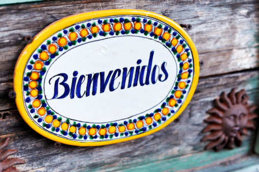 Bienvenidos Welcome Sign on Aged wood