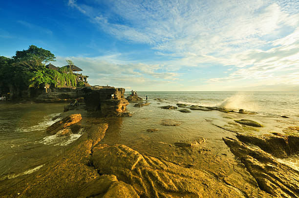 Old oriental temple, Bali Old oriental temple, Tanah Lot, from Bali, Indonesia. tanah lot sunset stock pictures, royalty-free photos & images