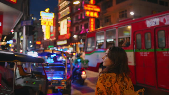 Woman walking in Chinatown in Bangkok