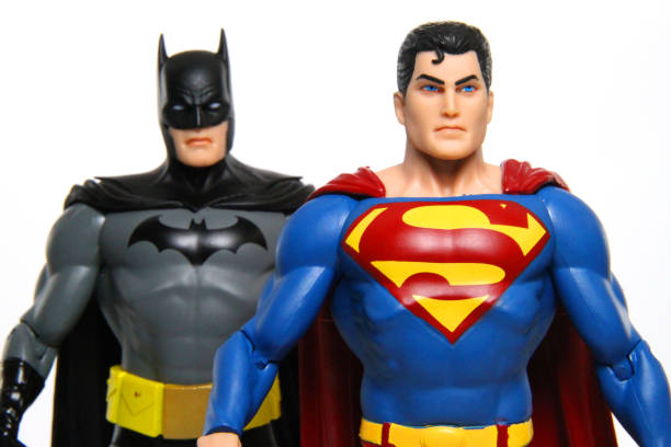 Defending the Earth "Vancouver, Canada - April 24, 2012: Action figure models of Superman and Batman, sculpted by Paul Harding and released by DC comics, against a white background." action figure photos stock pictures, royalty-free photos & images