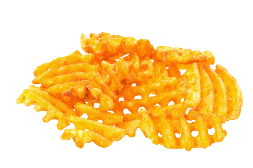 Potato waffle fries - studio shot with a white background
