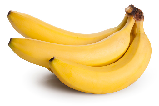 Ripe yellow big bananas isolated on white background. File contains clipping path