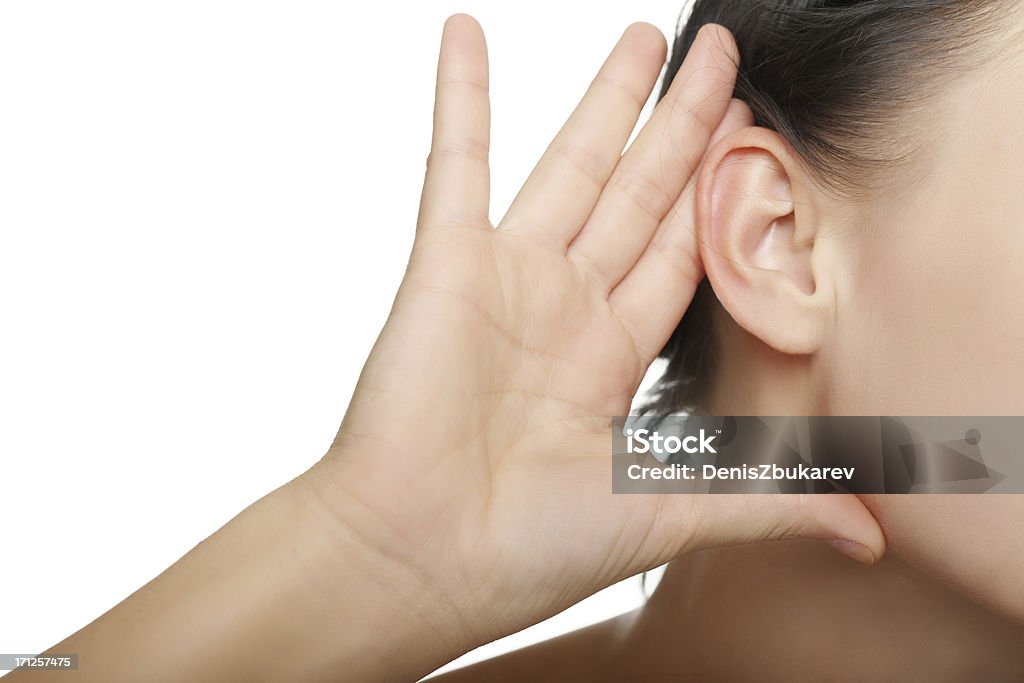 young woman listening Ear Stock Photo