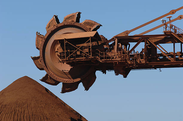 istock Reclaimer and Iron Ore Stockpile 171258276