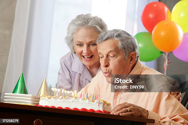 Senior Couple Stock Photo - Download Image Now - Blowing, Birthday Candle, Women