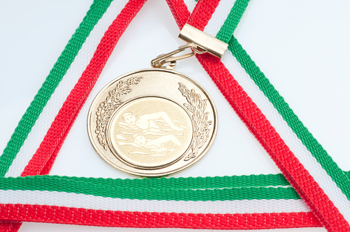 close up shot of gold medallion