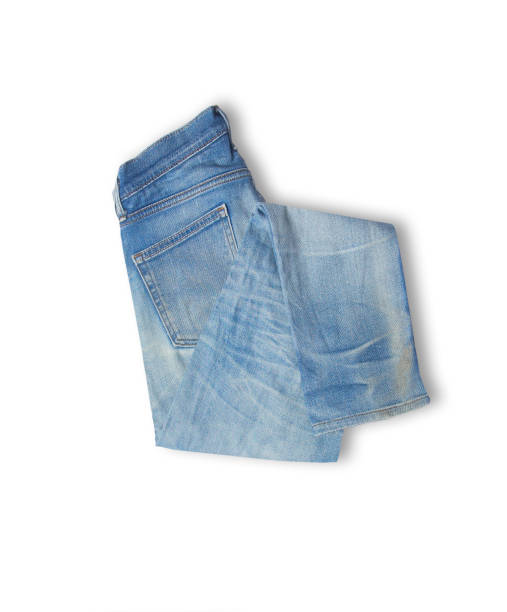 istock Denim texture in close up view with copy space isolate on white background with clipping path. Blue jeans pattern no seam with macro to preset about classic fashion cloths concept. Indigo color fabric 1712585588