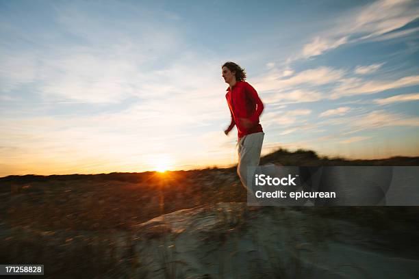 Young Healthy Man Running On The Beach Stock Photo - Download Image Now - 20-29 Years, Active Lifestyle, Adult