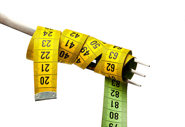 de dieta - healthy eating fork tape measure still life - fotografias e filmes do acervo