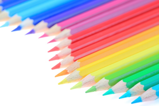 Color pencils arranged in a white background