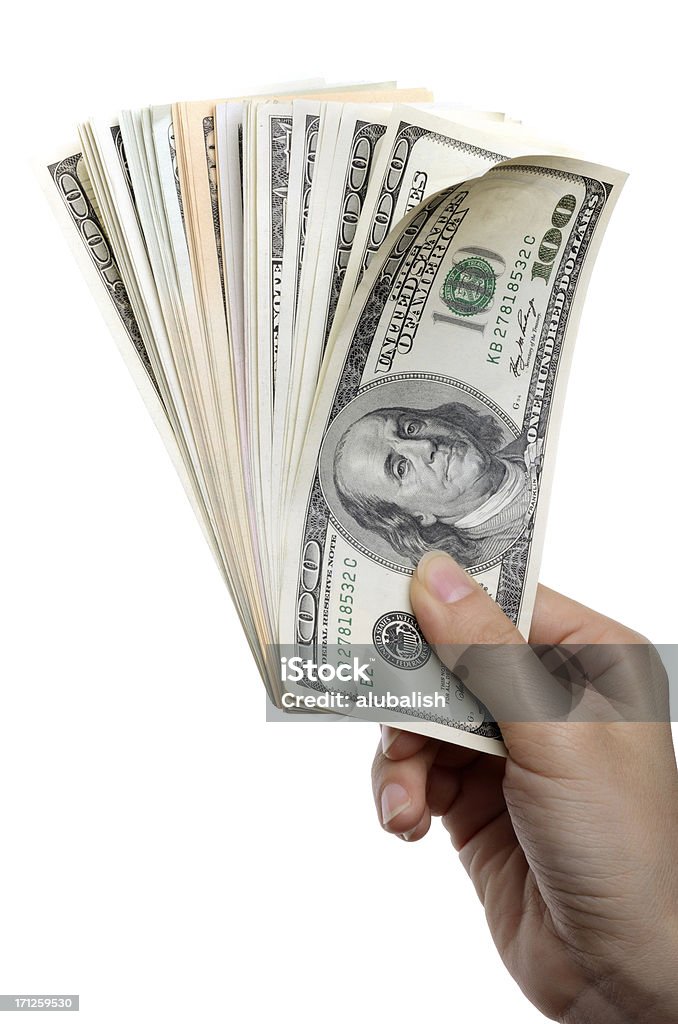 Dinero en la mano - Foto de stock de Agarrar libre de derechos