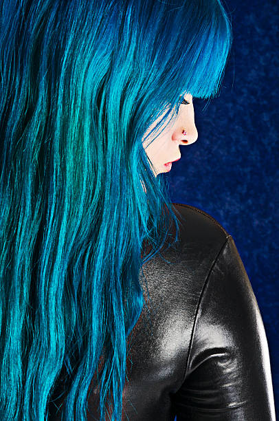 istock Profile of blue haired woman in black. 171259669