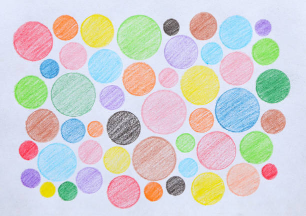 Multicolored polka dot pattern on paper drawing background. Colored pencil sketch. Hand painted quaint circles.