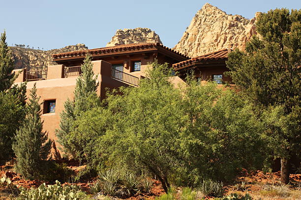 Villa Mansion Home Residence Yard Upscale mansion hideaway and front yard with desert mountain backdrop.  Sedona, Arizona, 2012. nook architecture photos stock pictures, royalty-free photos & images