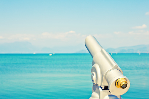 Binoculars in front of sea lookout