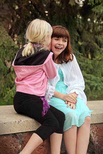 istock Little Girls Sharing a Secret 171261558