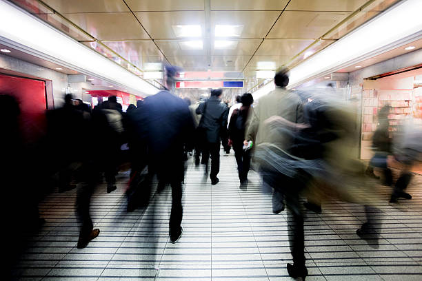 istock People walk through a crowded arcade during rush hour, Japan 171261752