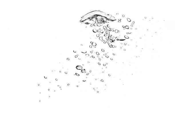 Close-up of clear water bubbles in white background stock photo