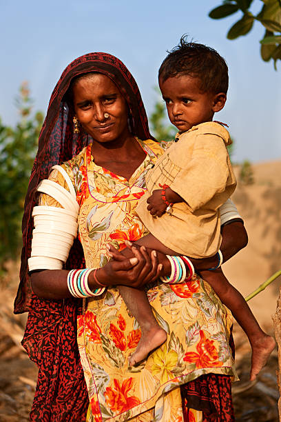 istock Indian woman holding her child 171262982