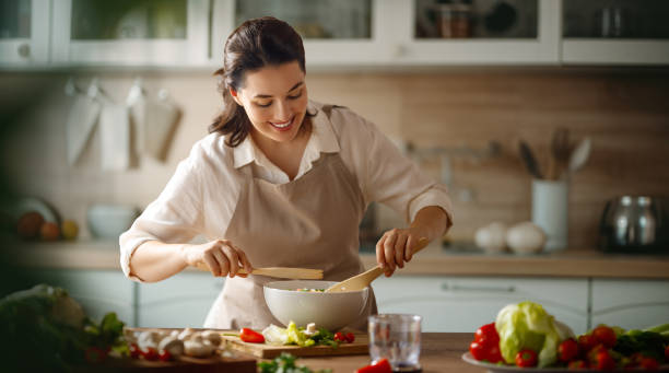 istock woman is preparing proper meal 1712630888