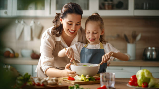 istock Happy family in the kitchen. 1712630892