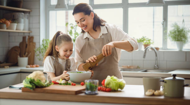 istock Happy family in the kitchen. 1712631392