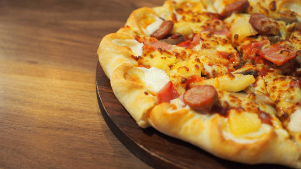 istock Pizza on wooden background for use as illrustration, background or copy space 1712631920
