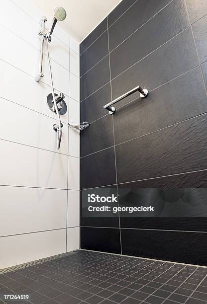 Shower Low Angle View Stock Photo - Download Image Now - Shower, Tiled Floor, Bathroom