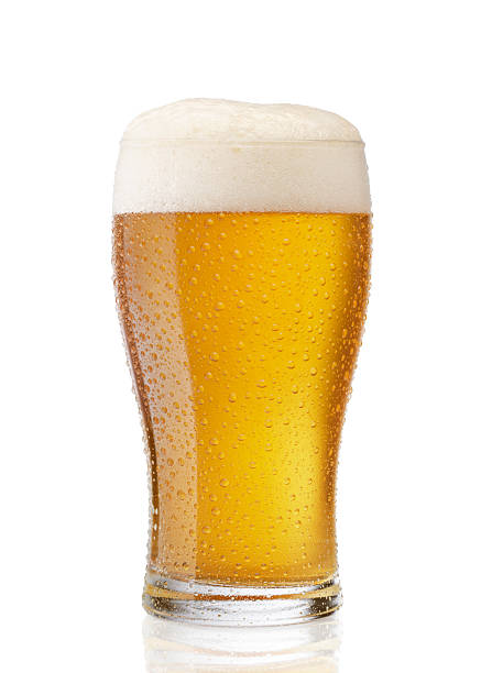 beer glass of cold beer isolated on white glass of beer stock pictures, royalty-free photos & images