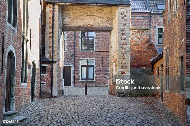 Beguine Courtyard In Leuven Stock Photo - Download Image Now - Leuven, Brick, Cobblestone