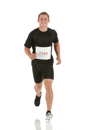 Male athlete runn ing in a marathon