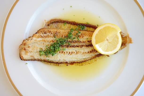 Fresh Sole Meuniere Served on a Plate stock photo