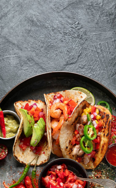 istock Mexican street tacos flat lay composition with lime, pepper and sauce 1712672827