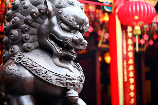 Traditional Chinese Metal lion sculpture in temple